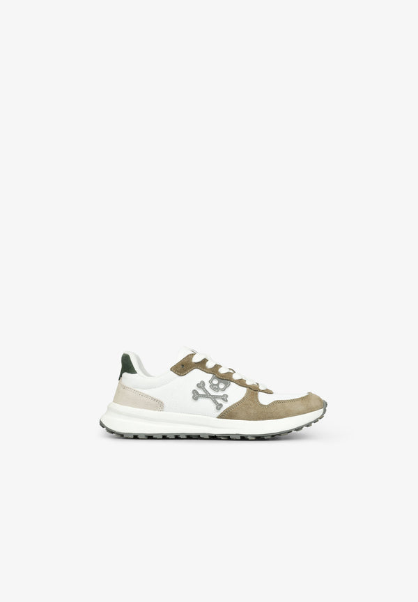 SNEAKER MIT TOTENKOPF UND GEZAHNTER SOHLE