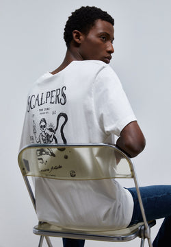 T-SHIRT IM WASHED-LOOK MIT PRINT AUF DEM RÜCKEN