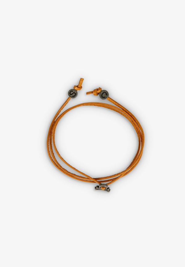 KORDELARMBAND MIT TOTENKOPF