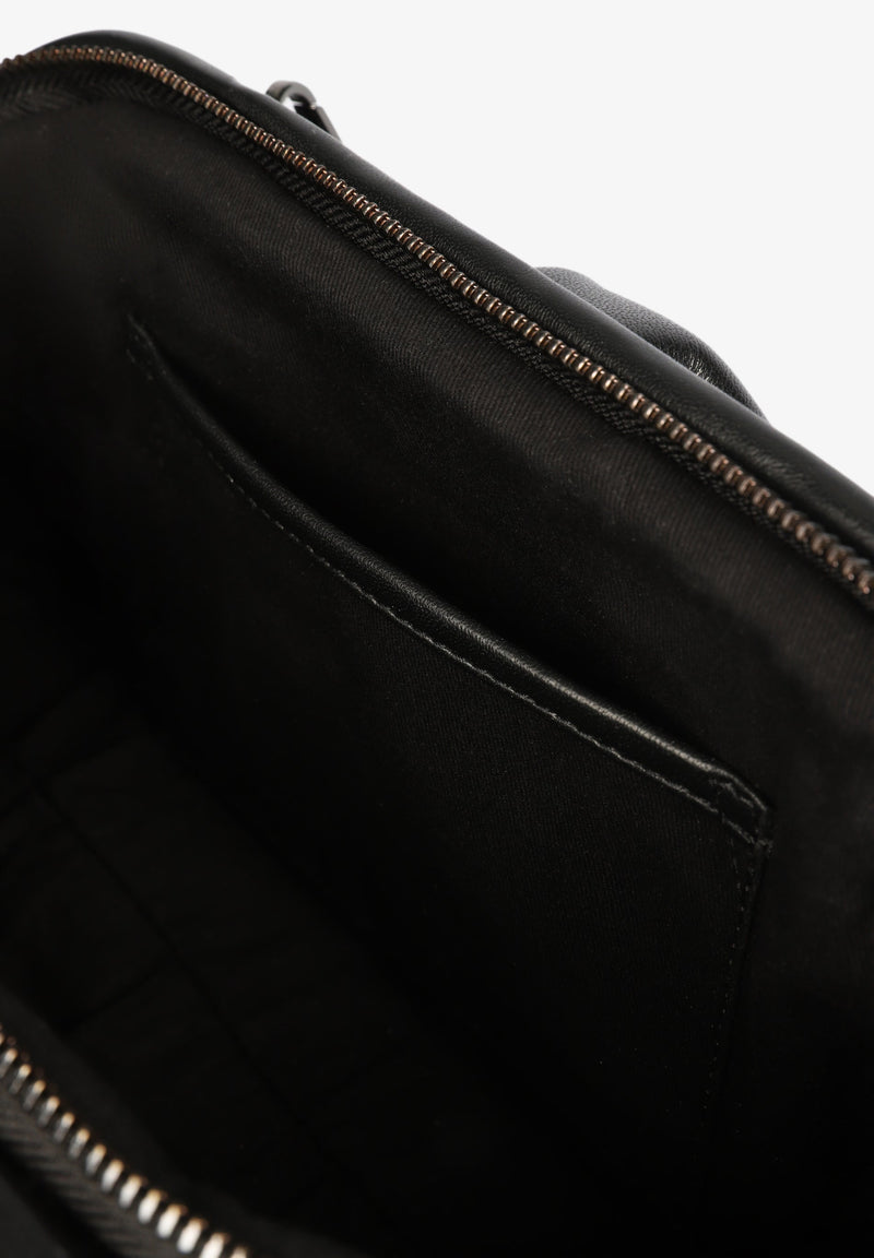GERAFFTE LEDER-CLUTCH