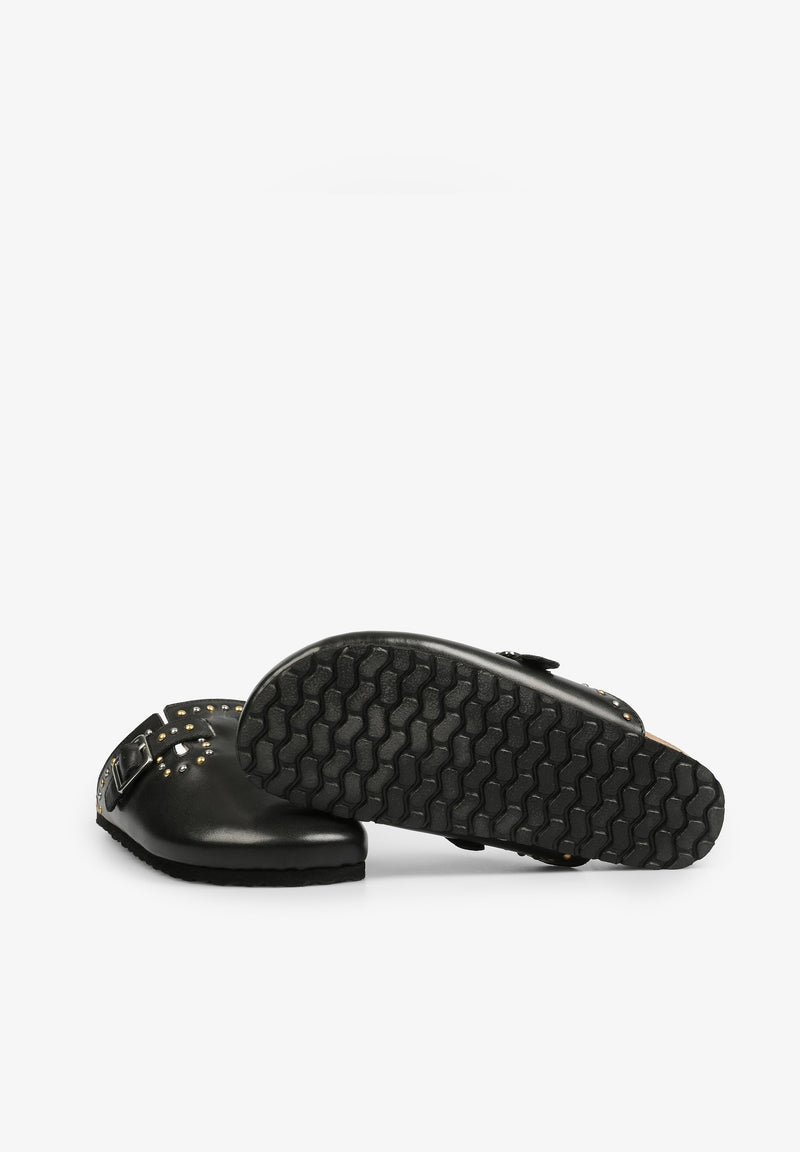 LEDERCLOGS MIT NIETEN