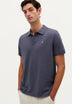 POLOSHIRT MIT FARBLICH ABGESETZTEM TOTENKOPF