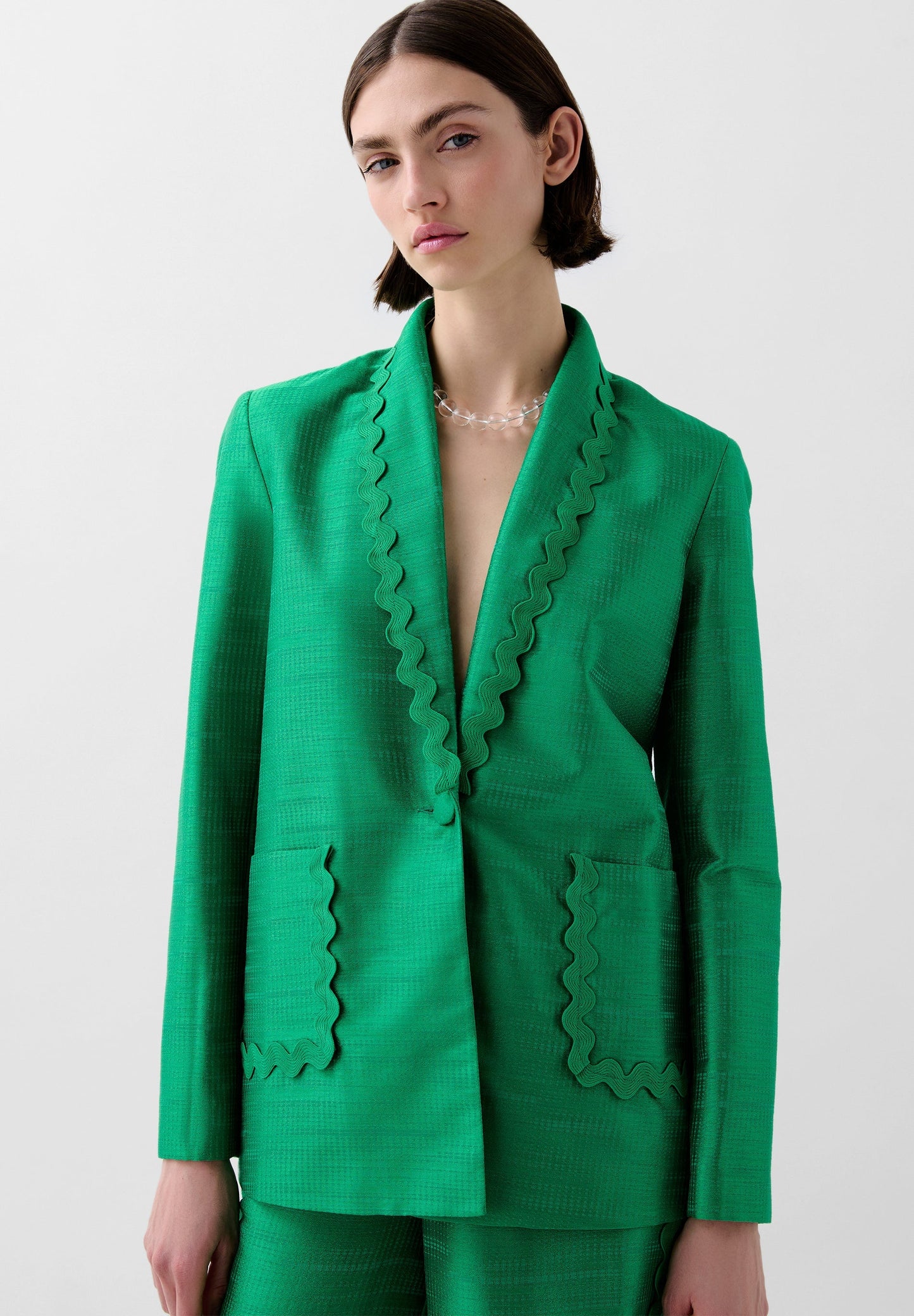 BLAZER MIT SCHULTERPOLSTERN UND WELLENMUSTER