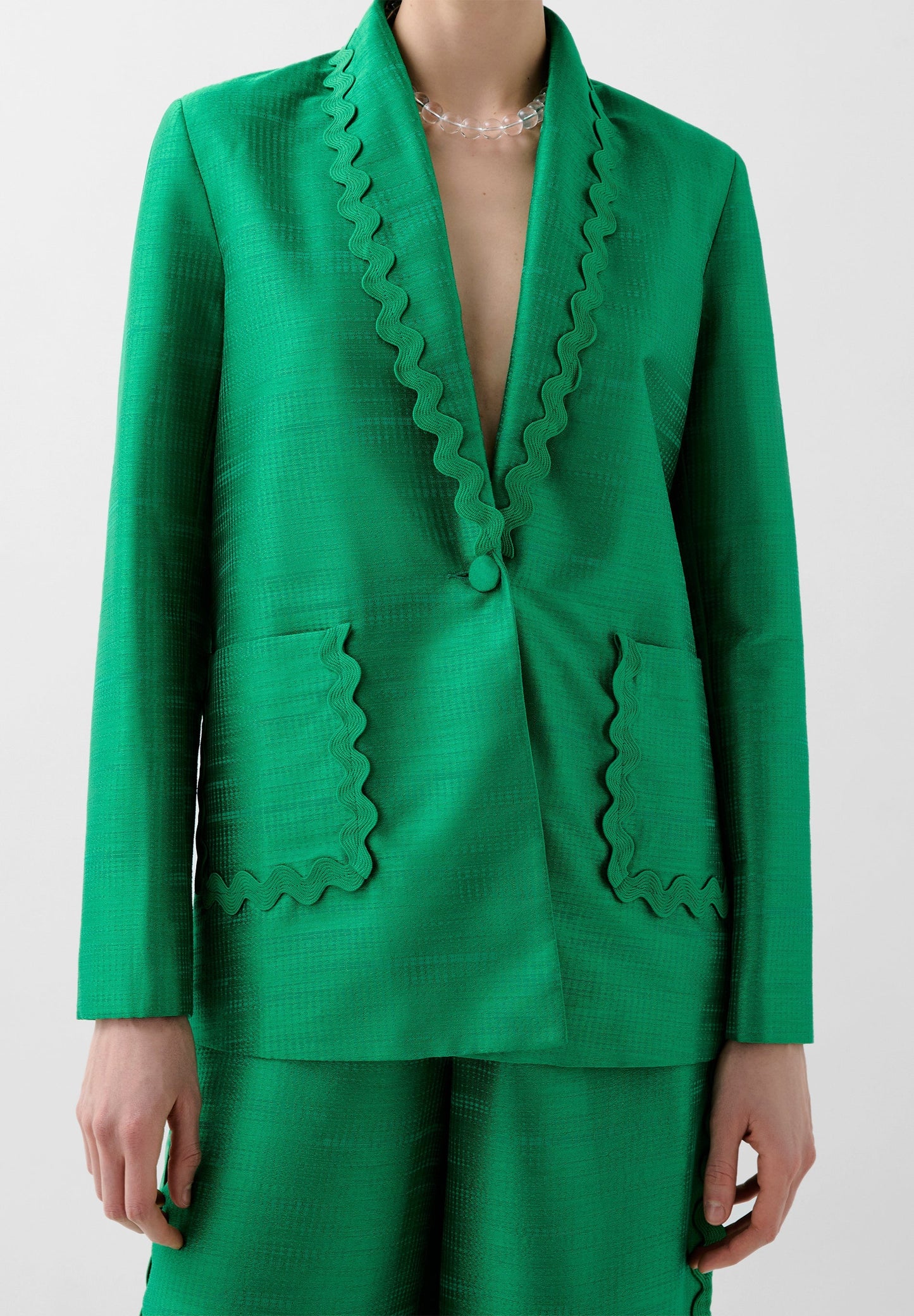 BLAZER MIT SCHULTERPOLSTERN UND WELLENMUSTER